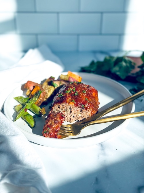Mini meatloaf on a plate.