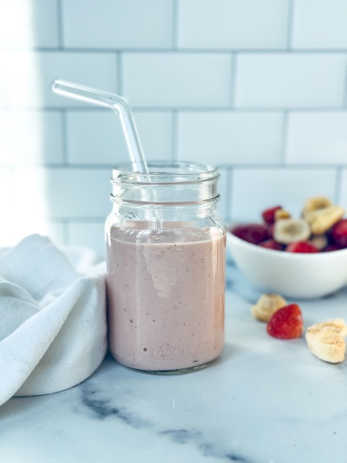 Peanut butter and jelly smoothie in a jar.