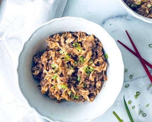 Bowl of ramen noodles with ground beef.