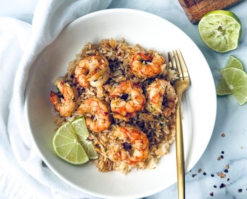 Garlic chili shrimp served over rice.