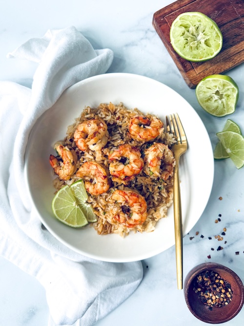 Garlic chili shrimp served over rice.