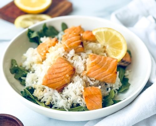 Honey mustard salmon over rice and arugula.