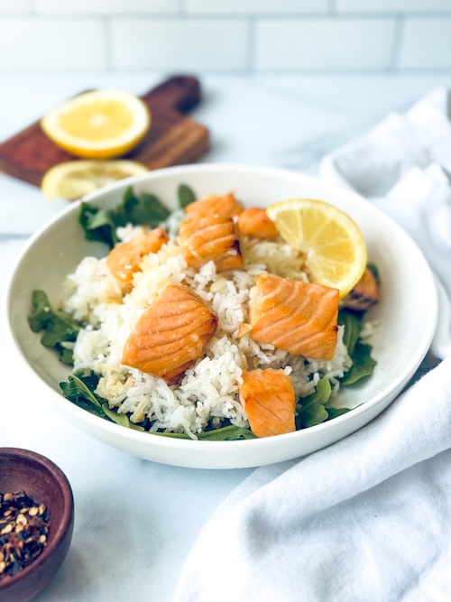 Honey mustard salmon over rice and arugula.