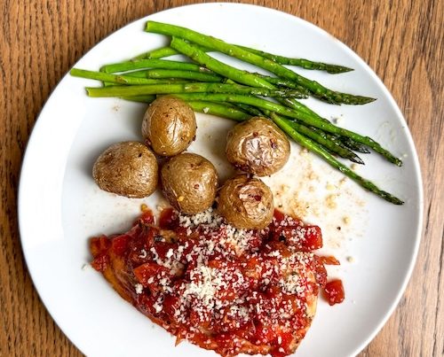 Plate of balsamic chicken with potatoes.