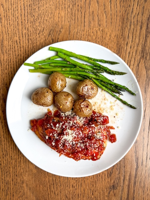 Plate of balsamic chicken with potatoes.