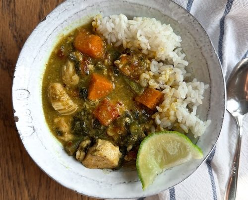 Bowl of chicken curry with rice.
