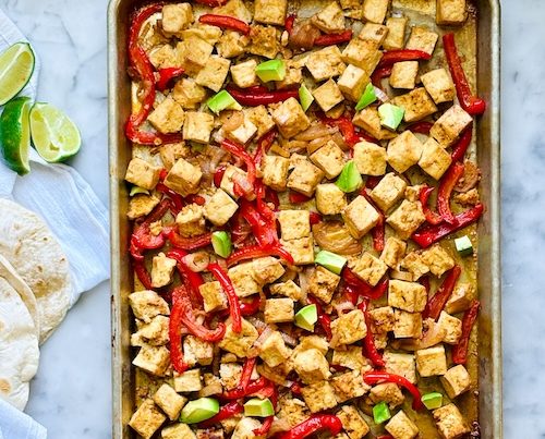 A sheet pan of tofu and fajita veggies.
