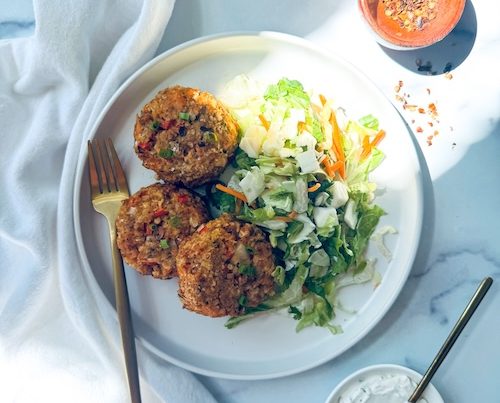 A plate with Cajun salmon cakes.