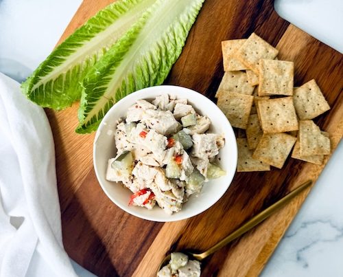 Dill pickle chicken salad with crackers and lettuce.