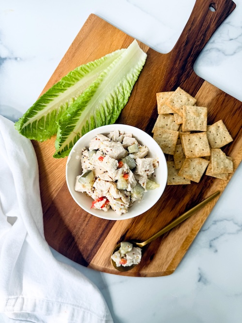 Dill pickle chicken salad with crackers and lettuce.
