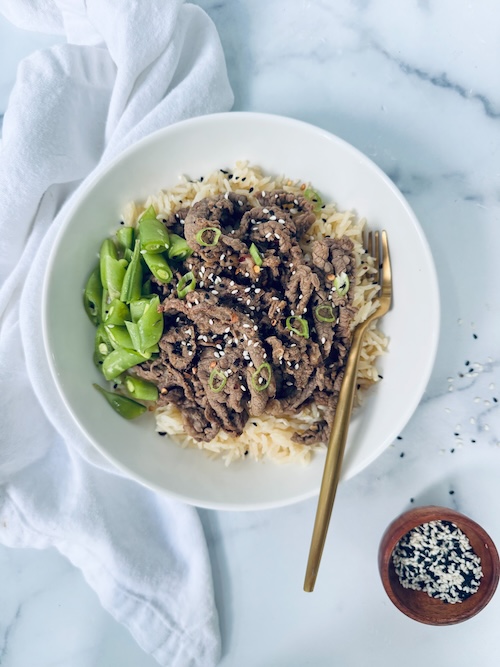 A bowl of Korean BBQ beef over rice.