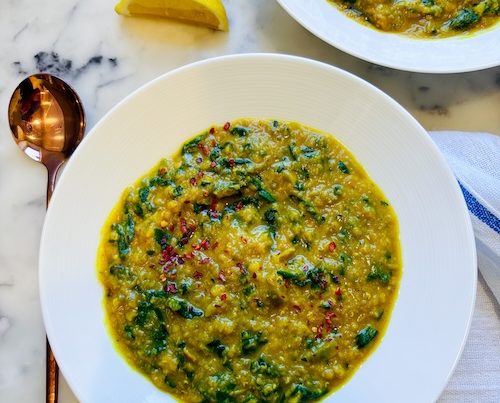 A bowl of lemony spinach red lentils.