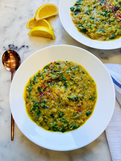 A bowl of lemony spinach red lentils.