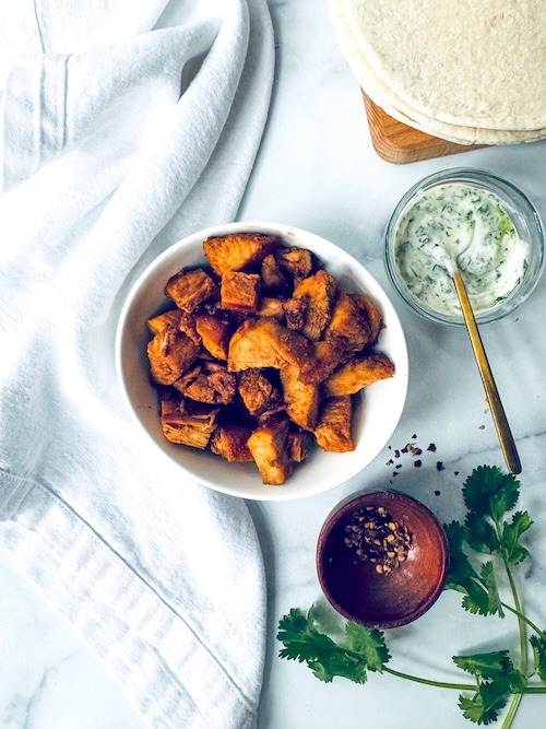 Diced hot honey chicken in a bowl for tacos.