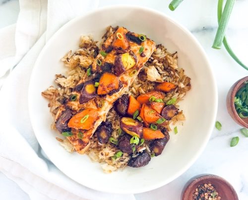 Miso butter salmon with rice and carrots in a bowl.