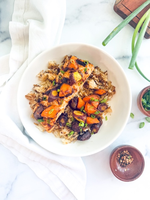 Miso butter salmon with rice and carrots in a bowl.