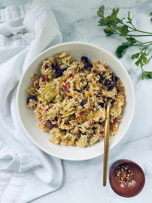 Bowl of vegetarian pesto fried rice.