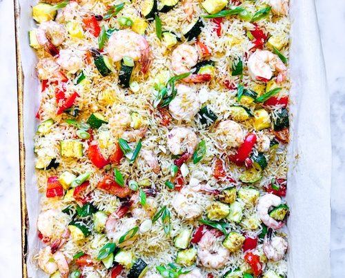 Sheet pan of cajun shrimp and veggies.