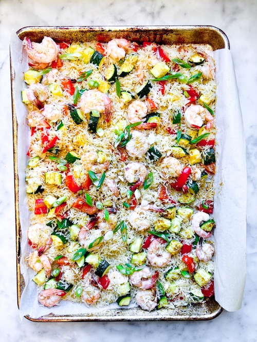 Sheet pan of cajun shrimp and veggies.