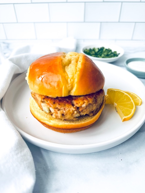 Tuna burger on a brioche roll.