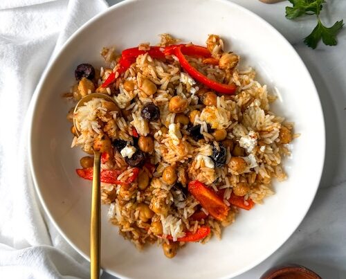 Sheet pan Greek chickpeas and peppers in a bowl.