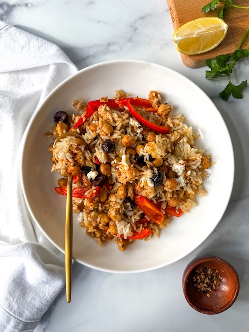 Sheet pan Greek chickpeas and peppers in a bowl.