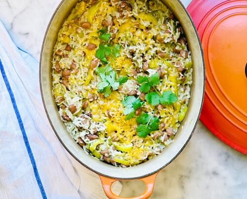 Cheddar Chile rice bake in a casserole dish.