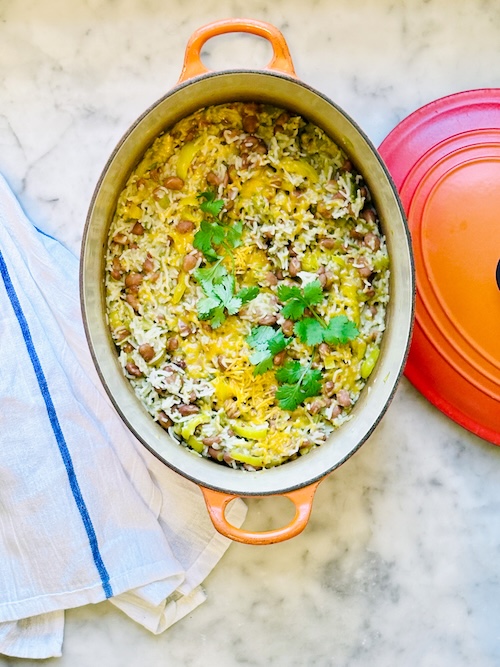 Cheddar Chile rice bake in a casserole dish.