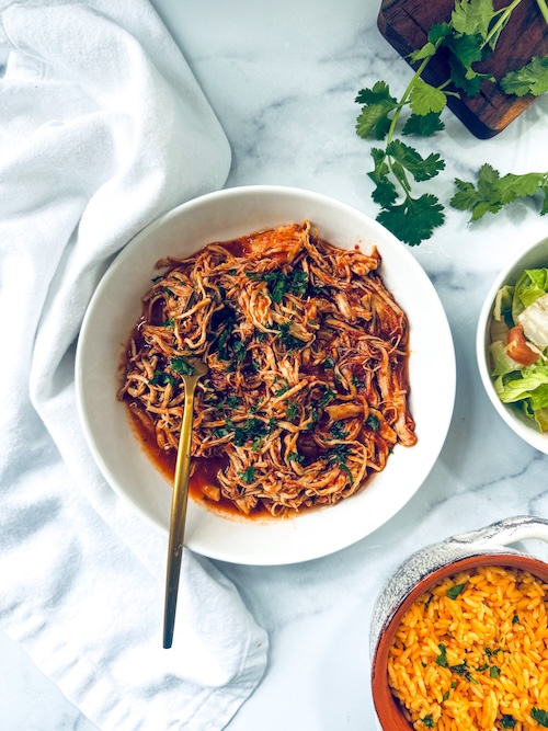 Bowl of shredded chipotle chicken.