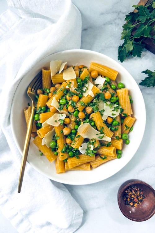 Garlic herb pasta with chickpeas in a bowl.