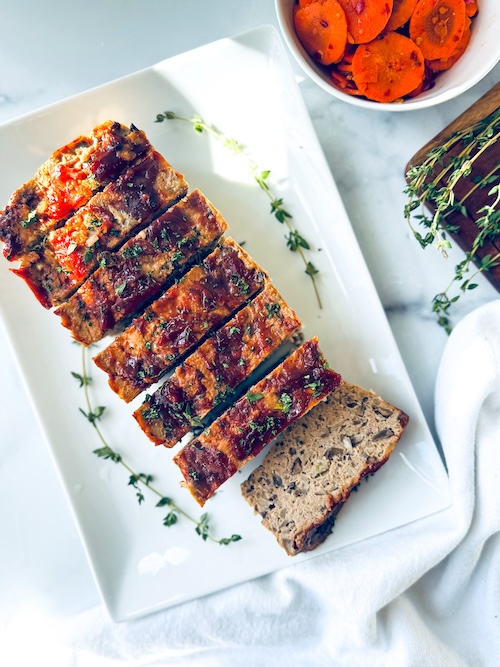 Turkey meatloaf sliced on a platter.