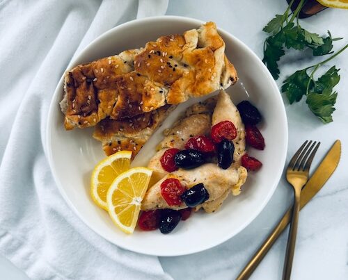 Mediterranean baked chicken with olives.