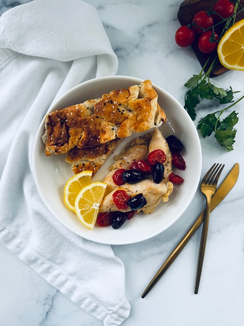 Mediterranean baked chicken with olives.