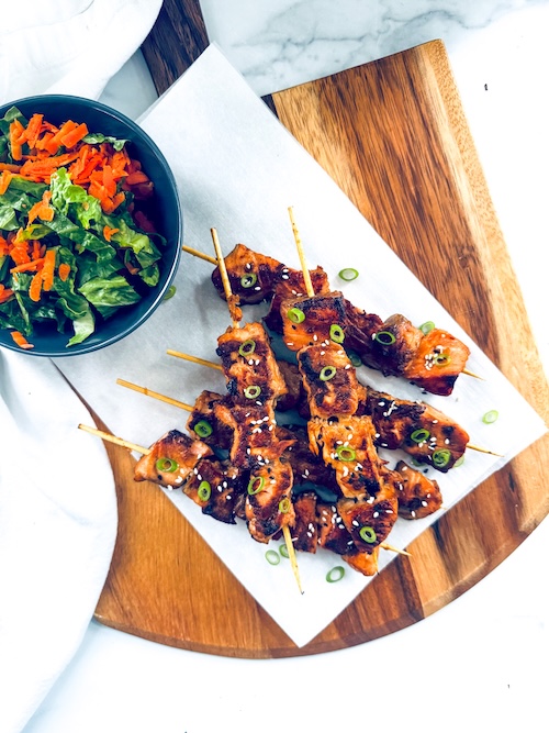 Sesame soy salmon on skewers.