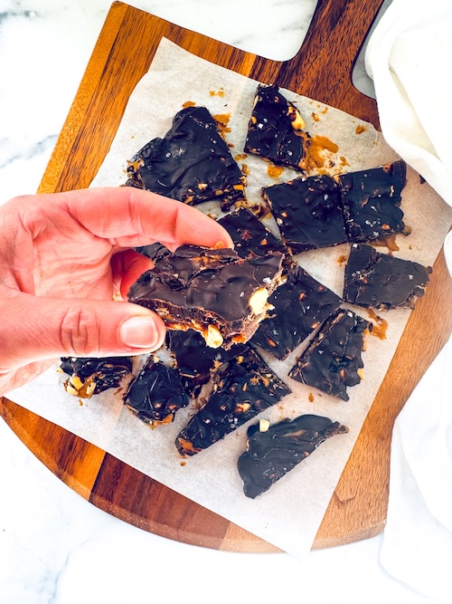 5-Ingredient Snickers date bark on a board.