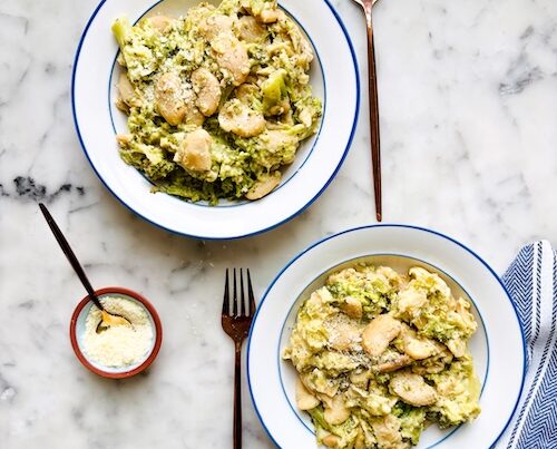 Two bowls of butter bean broccoli Alfredo.