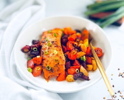 Hot honey glazed salmon with spiced carrots.