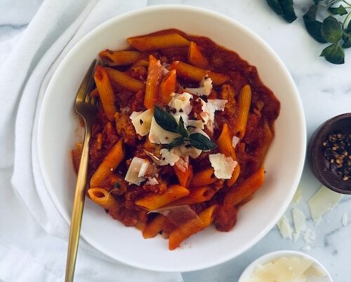 A bowl of Italian sausage pasta.