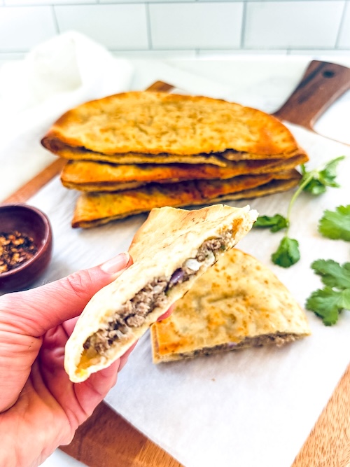 Meat stuffed pitas.