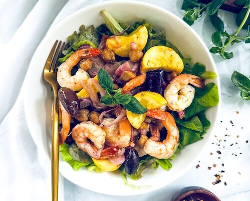 Shrimp and chickpeas over spinach.