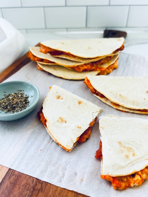 A stack of pizza tacos.