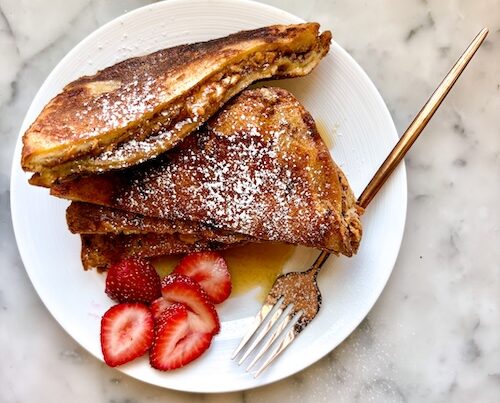 PBJ French Toast sandwiches on a plate.